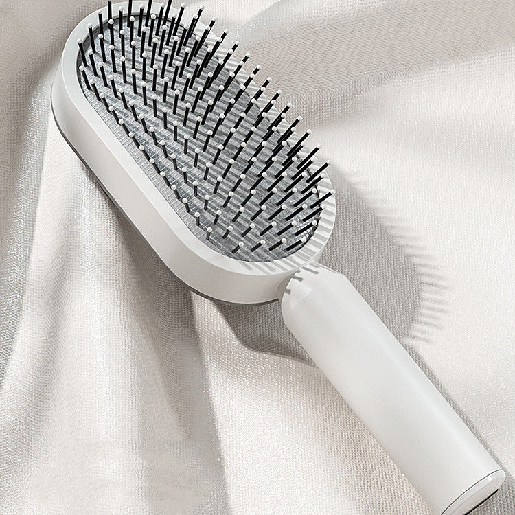 Self-cleaning brush — one click, smooth hair, gentle scalp care