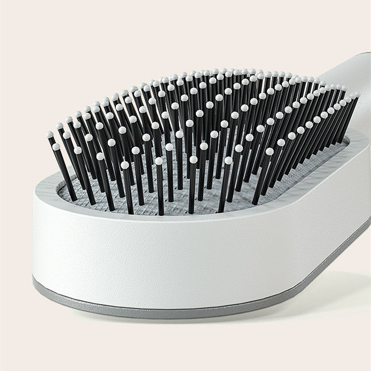 Self-cleaning brush — one click, smooth hair, gentle scalp care